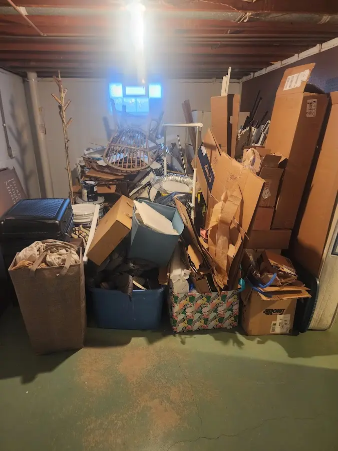 Roll-off dumpster container at job site for 6 Yard Dumpster Rental in Monett